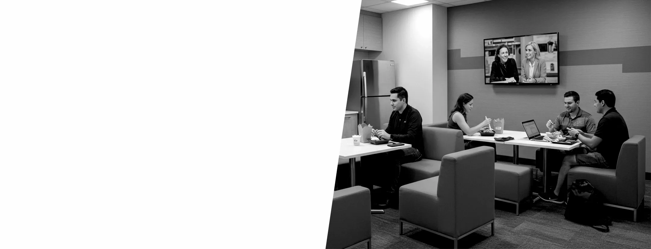 employees in break room with TV